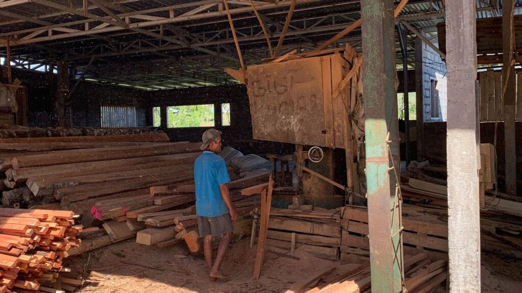 Man working in a timber barn in Bali